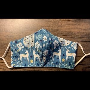 Fitted Fair Isle mask with filter pocket , nose wire , and adjustable ear loops